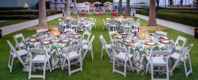 Corporate dinner on the Event Lawn with chairs and round tables